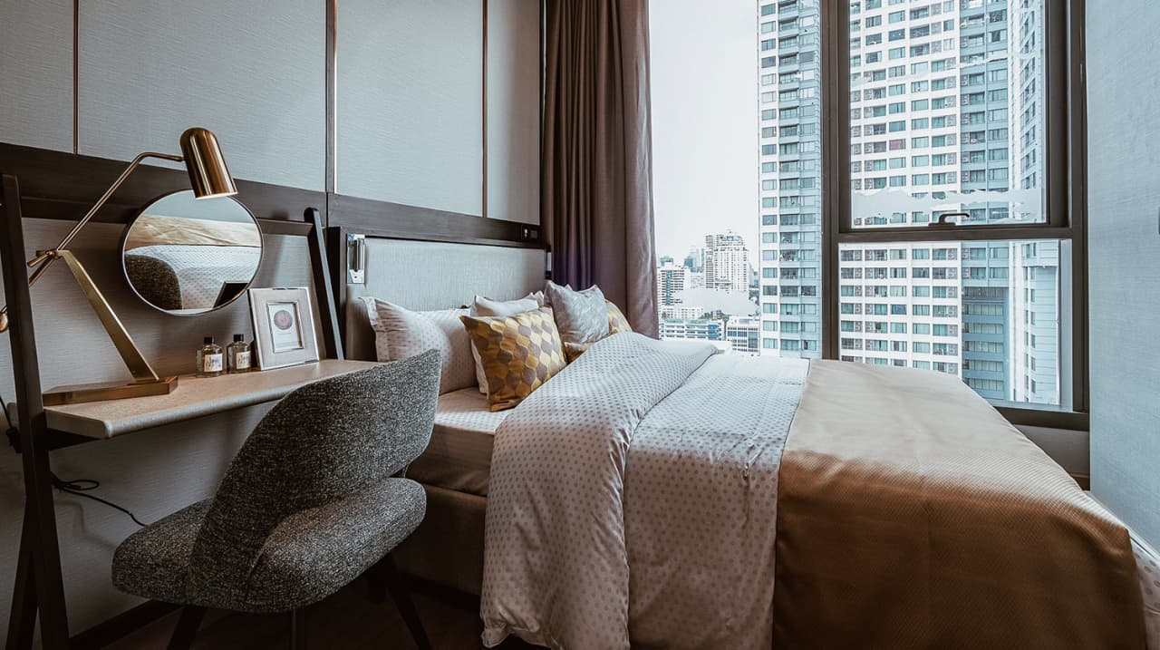 The Esse at Singha Complex official show residence: Bedroom and work desk